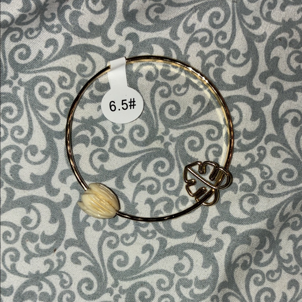 Elegant Gold and Cream Pikake Bangle Bracelet